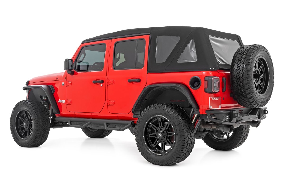 Jeep Wrangler Nerf Steps - Wheel to Wheel - Rough Country - 4 Door, Integrated Stone Guards - '07-'10